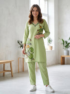 AI Studio Photo - Standing with one hand adjusting clothing, natural candid moment, front view, full body. CAMERA SHOT: A FULL BODY shot capturing the person from head to toe. [Full body]